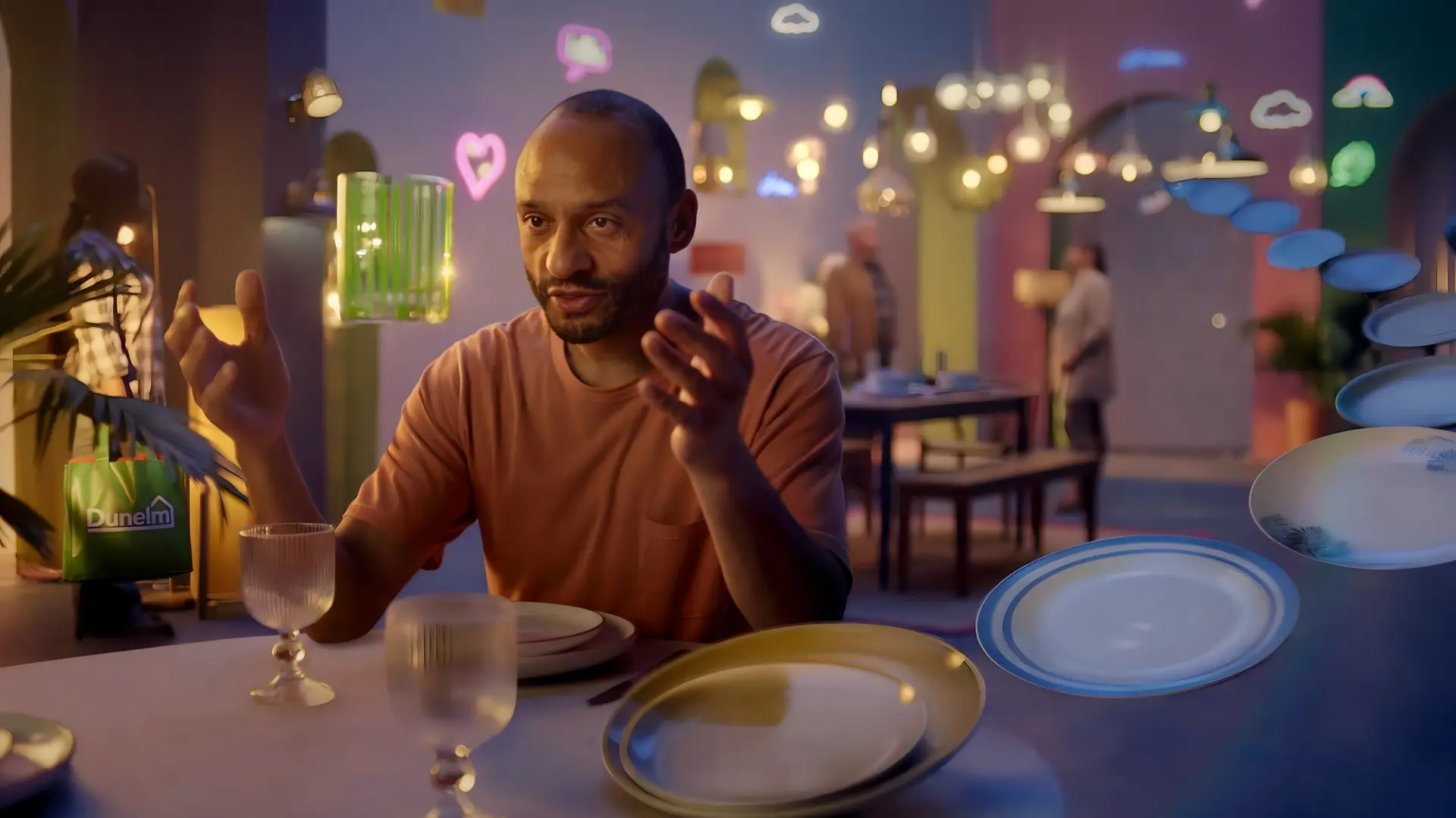 Guy ponders a glass in You're The One That I Want